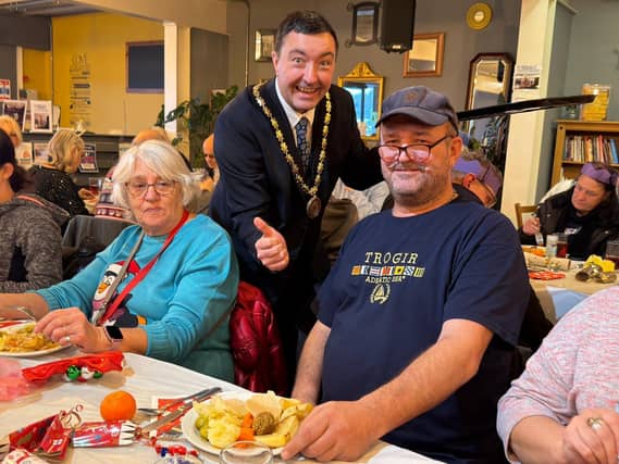 Mayor of Skegness Coun Jimmy Brookes helps serve at the Storehouse Christmas Community Meal.