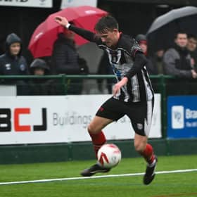 Brigg fans and players alike suffered in storm conditions during Saturday's draw with Selby. Pic by Anna Bäckström.