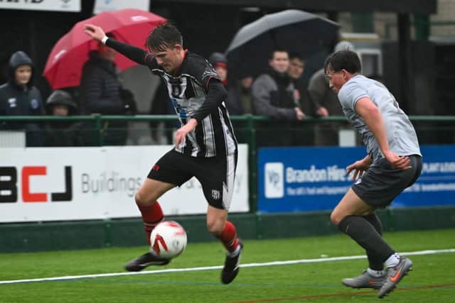 Brigg fans and players alike suffered in storm conditions during Saturday's draw with Selby. Pic by Anna Bäckström.