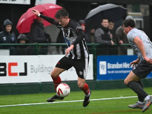 Brigg fans and players alike suffered in storm conditions during Saturday's draw with Selby. Pic by Anna Bäckström.