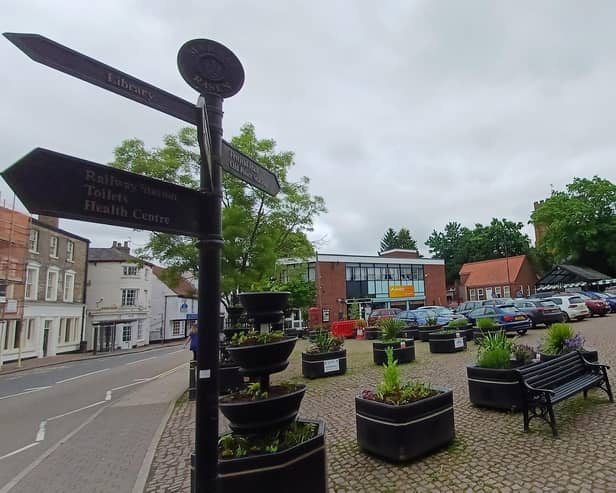 Parking will continue in the market place