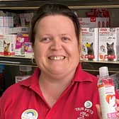 Donna from Trim Pets in Gainsborough with the hand sanitiser