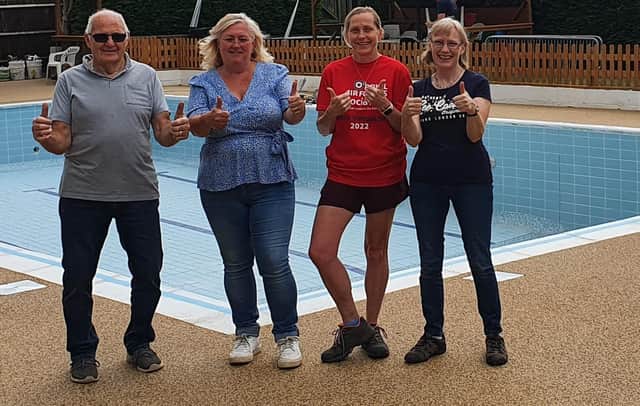 The management team celebrating Metheringham Swimming Pool renovation.