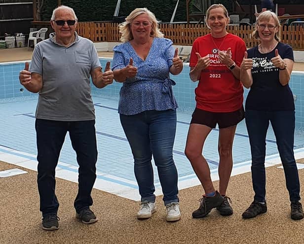 The management team celebrating Metheringham Swimming Pool renovation.