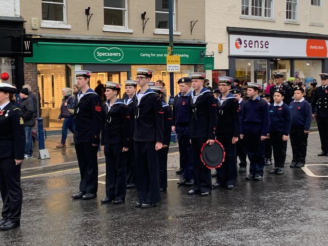 Navy cadets pictured at the end of the parade to Boston's War Memorial.
