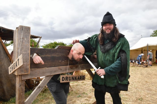 Vitali Spitsyn in the stocks, with Corey Hart of the Knights of Skirbeck