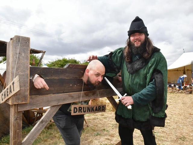 Vitali Spitsyn in the stocks, with Corey Hart of the Knights of Skirbeck