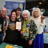 L-R Rotarians Paula Ireland, Erin Mann, Keith Phillips, Jane Peck, Ann Waldeck, Barbara Roberts and Maggie Carr at the Gin and Fizz festival. Photo: David Dawson