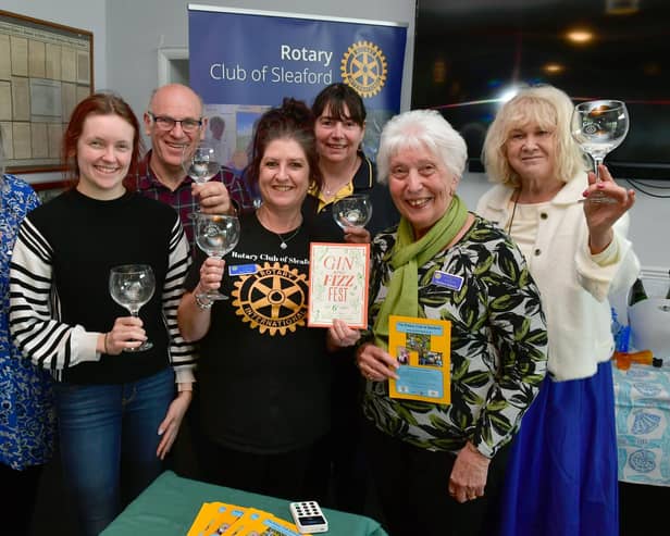 L-R Rotarians Paula Ireland, Erin Mann, Keith Phillips, Jane Peck, Ann Waldeck, Barbara Roberts and Maggie Carr at the Gin and Fizz festival. Photo: David Dawson