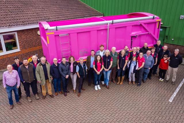 Bailey Trailers staff with invited guests and Ollie Chessum at the draw for the pink trailer in aid of Breast Cancer Now.