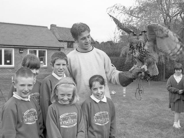 Stickney Primary School playing host to Phoenix the eagle owl and handler Tristan Walker, from the Hawkshead English School. Watching were youngsters Grace Rundle, Robert Linnell, Martin Spriggs, Lana Whittaker and Nicola Cook.