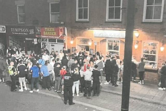 Police respond to a large crowd outside The Grapes pub, Southgate, Sleaford. From Lincolnshire Police's submission to North Kesteven District Council, asking for the pub's licence to be reviewed. (Approved for use by all partners)