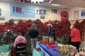 All hands on deck in the Skegness Royal British Legion poppy shop.