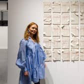 Wall based ceramics in the main exhibition at The Hub with artist Rosa Wiland Holmes, who is also leading a pottery workshop. Photo: Jules Lister