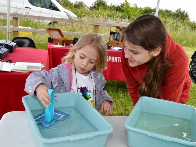 L-R Harriet Eaves 6 of Swaton making Cyanotypes, an early form of victorian photography, helped by Tilda Hatton 11