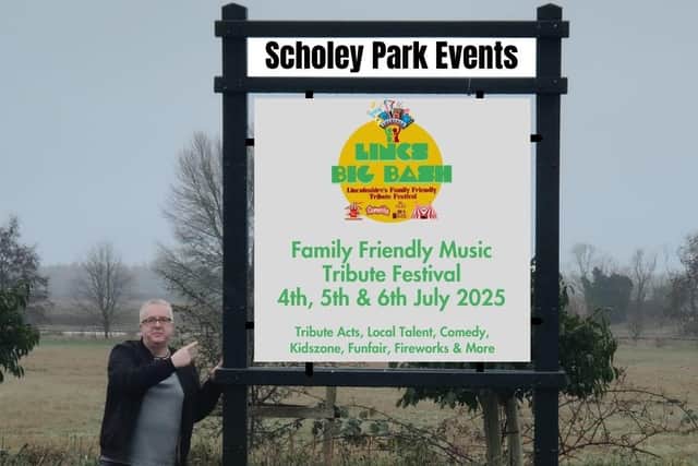 Organiser David Charles points the way as the stage is set for Lincs Big Bash 2025 at Scholey Park, near Woodhall Spa.
