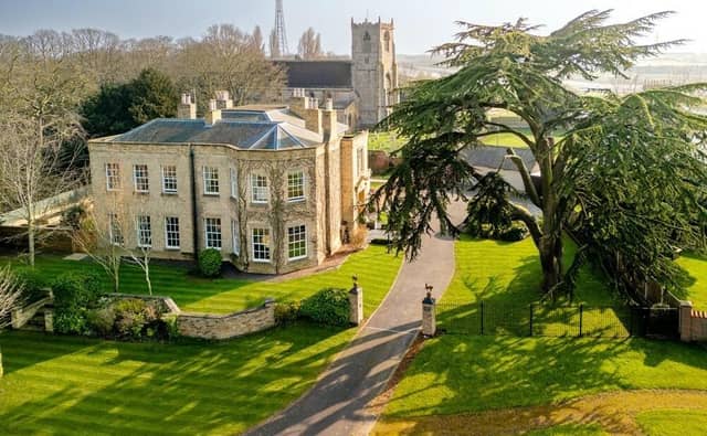 Skirbeck Hall, in Boston, with St Nicholas Church in the background.