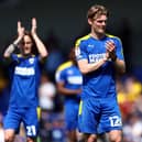 AFC Wimbledon midfielder Jack Rudoni has caught the eye of Huddersfield Town, Sunderland and Bristol City.