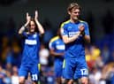 AFC Wimbledon midfielder Jack Rudoni has caught the eye of Huddersfield Town, Sunderland and Bristol City.