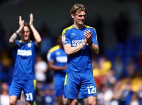 AFC Wimbledon midfielder Jack Rudoni has caught the eye of Huddersfield Town, Sunderland and Bristol City.