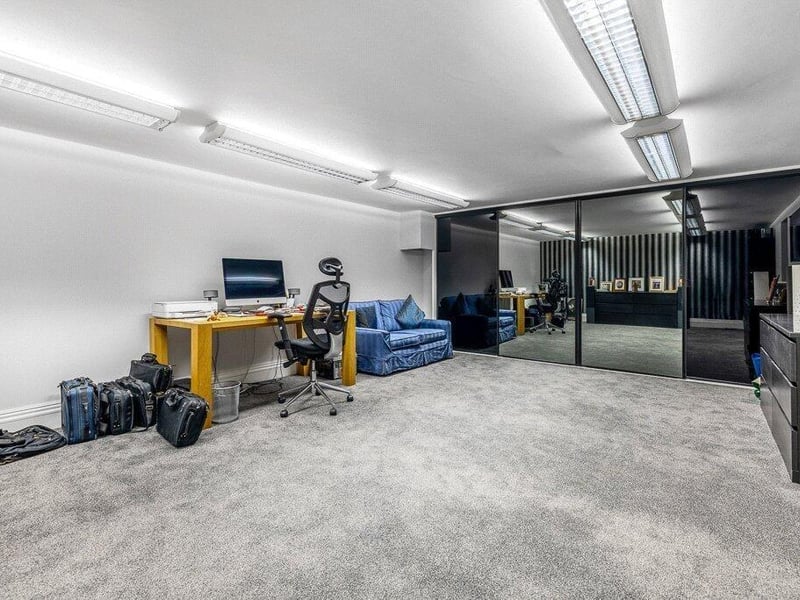 The basement double bedroom space, currently used as an office.