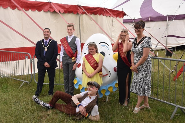 VIP guests with a circus clown outside the Bog Top before the show.