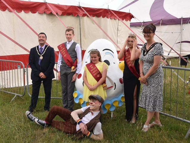 VIP guests with a circus clown outside the Bog Top before the show.