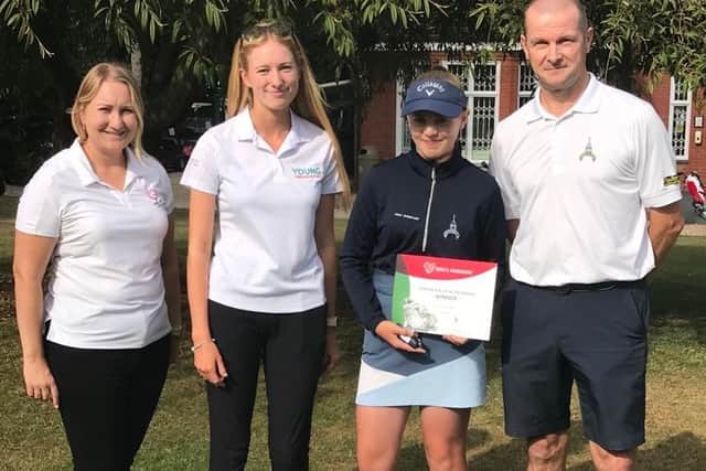 Abigail Scott receives the England Golf Hero’s Handshake award.