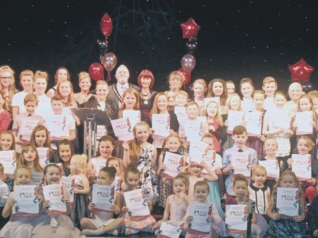 Members of Skegness' Lisa Jay Stage Institute with the resort's deputy mayor and mayoress Coun George and Julie Saxon during its annual awards ceremony, held at the Embassy Theatre.