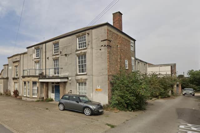 The former Douglas Electronics Industry building on Eastfield Road.