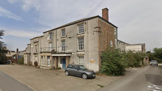 The former Douglas Electronics Industry building on Eastfield Road.
