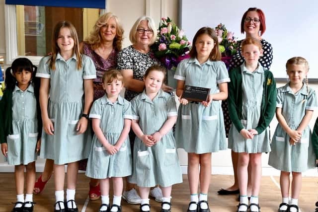 Pupils who took part in St George's Preparatory School's poetry competition pictured with the judges.