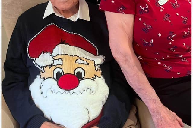 Colleague and resident at HC-One Elmwood House Care Home’s Christmas Party last year