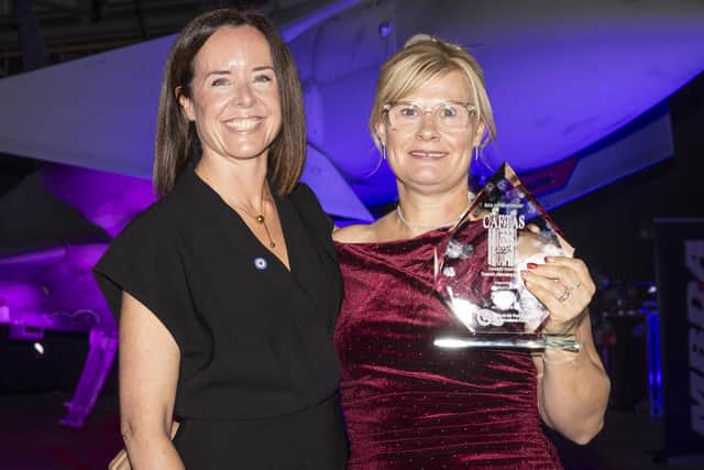 Sue Elder receives the award for improving station life, sponsored by the RAF Benevolent Fund. (PHOTO BY: Sgt Nicholas Egan/RAF)