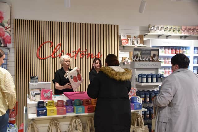 Free tote bags were offered to the first 100 customers.