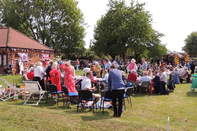 Crowds gathered for the party on the green outside Brant Broughton village hall after the jubilee parade.