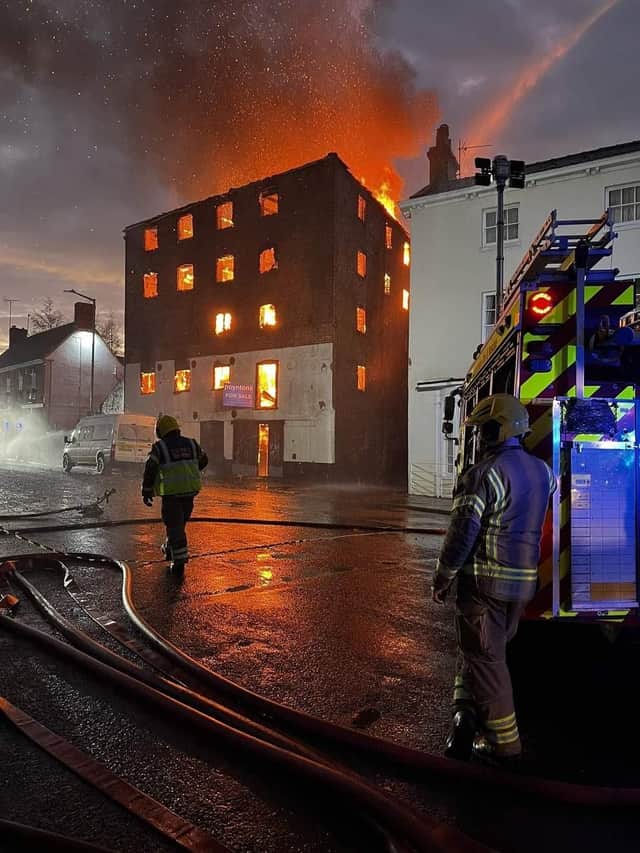 Firefighters on scene at the height of the blaze in the old warehouse on London Road, Boston. Photo: Matt King