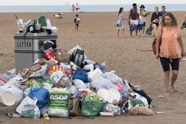 Bins were overflowing after visitors during last week's heatwave dumped their rubbish  rather than take it home.