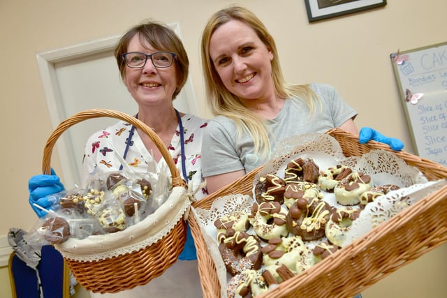 L-R Sue Littlejohn and Mary Littlejohn of South Kyme, selling cakes. Photo: David Dawson