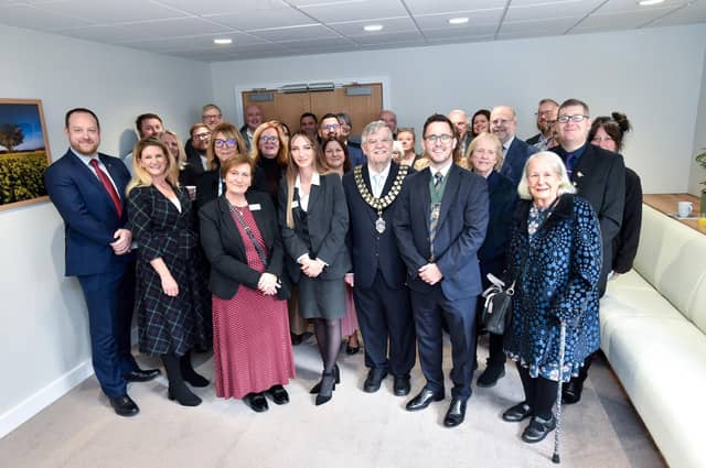 Funeral team and VIP guests
