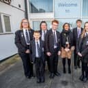 Barnes Wallis's Head of School Miss Charlotte Dunsford with pupils celebrating their 'Good' Ofsted.