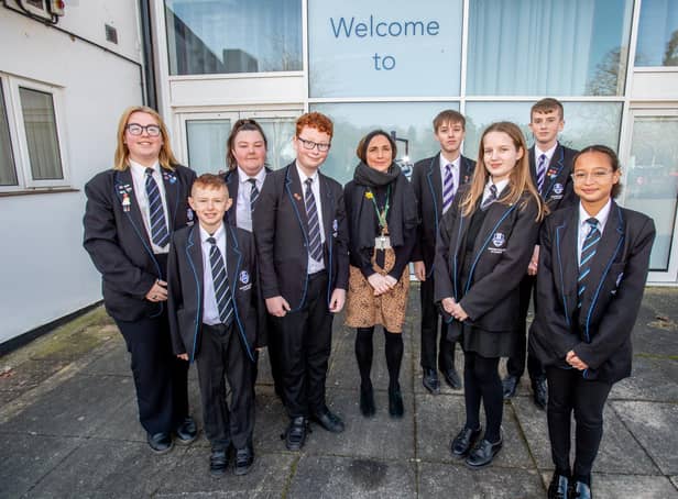 Barnes Wallis's Head of School Miss Charlotte Dunsford with pupils celebrating their 'Good' Ofsted.