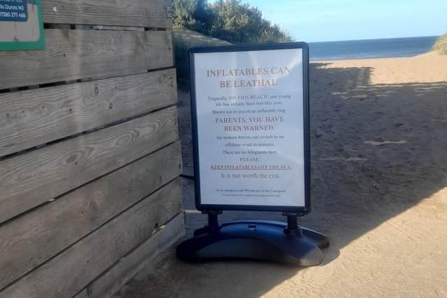 The 'Inflatables can be lethal' warning outside the Cloud Bar at Anderby Creek.