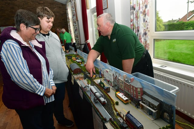 Ellen Watts of Digby and Noah Rawins, 15, with club member Ian Hides of Metheringham.