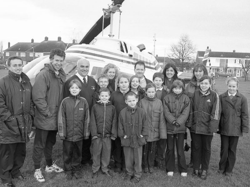 Pupils of Staniland Primary School being treated to a ride in a helicopter. The experience was arranged by Boston Crop Sprayers after pupils helped with Boston Borough Council's tree-planting initiative on the business' land the previous year.