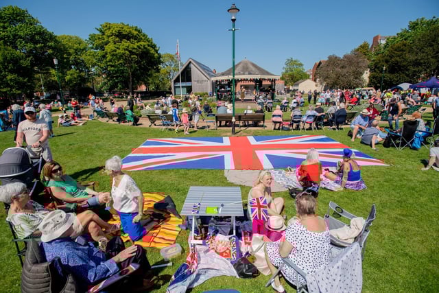 Crowds sat around the Union Flag at the Skegness VE/VJ 80 Picnic in the Park.