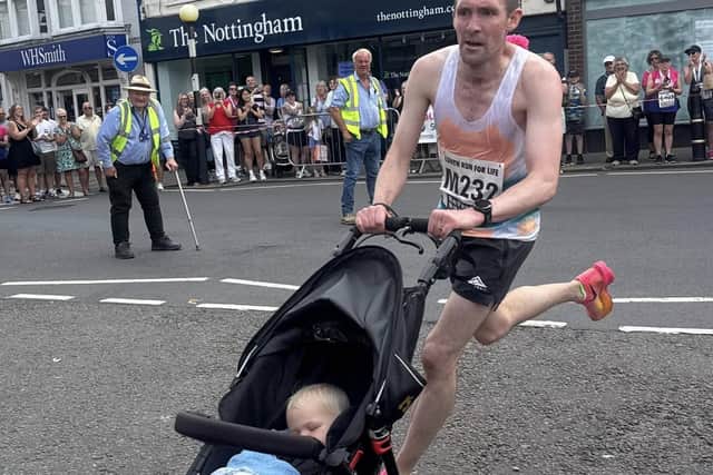 A pushchair helped this double act complete the course.