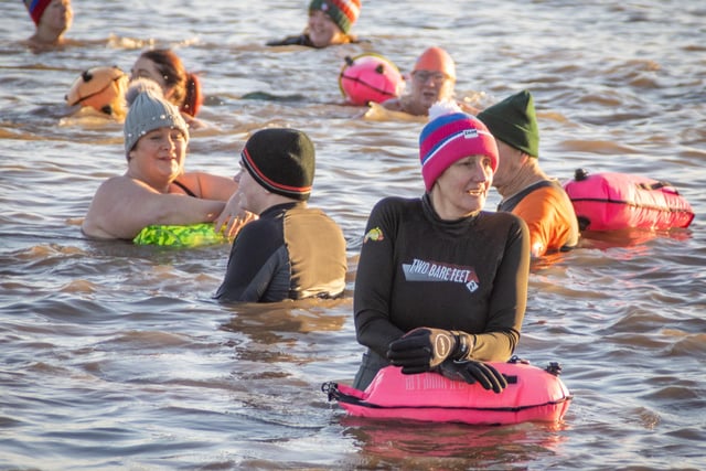 Enjoying a New Year's Day dip and members of Wild at Heart.