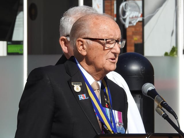 Sleaford RBL branch vice-chairman Clive Candlin reads of the names of those Sleaford men who died in the Far East.