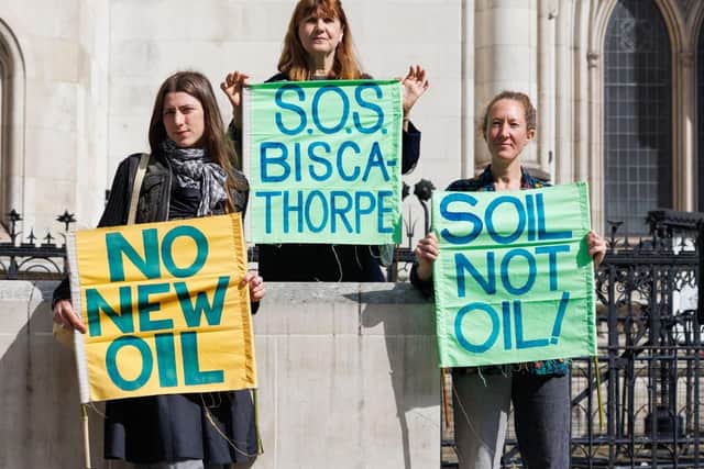 Protestors outside the High Court. © Crispin Hughes